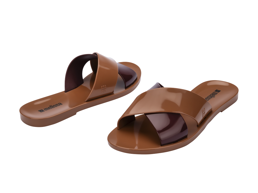 MELISSA ESSENTIAL CROSS SLIDE AD – 