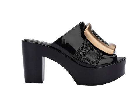 MELISSA MULE BUCKLE UP + VIKTOR AND ROLF AD