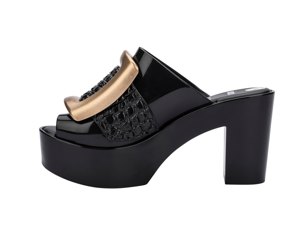 MELISSA MULE BUCKLE UP + VIKTOR AND ROLF AD